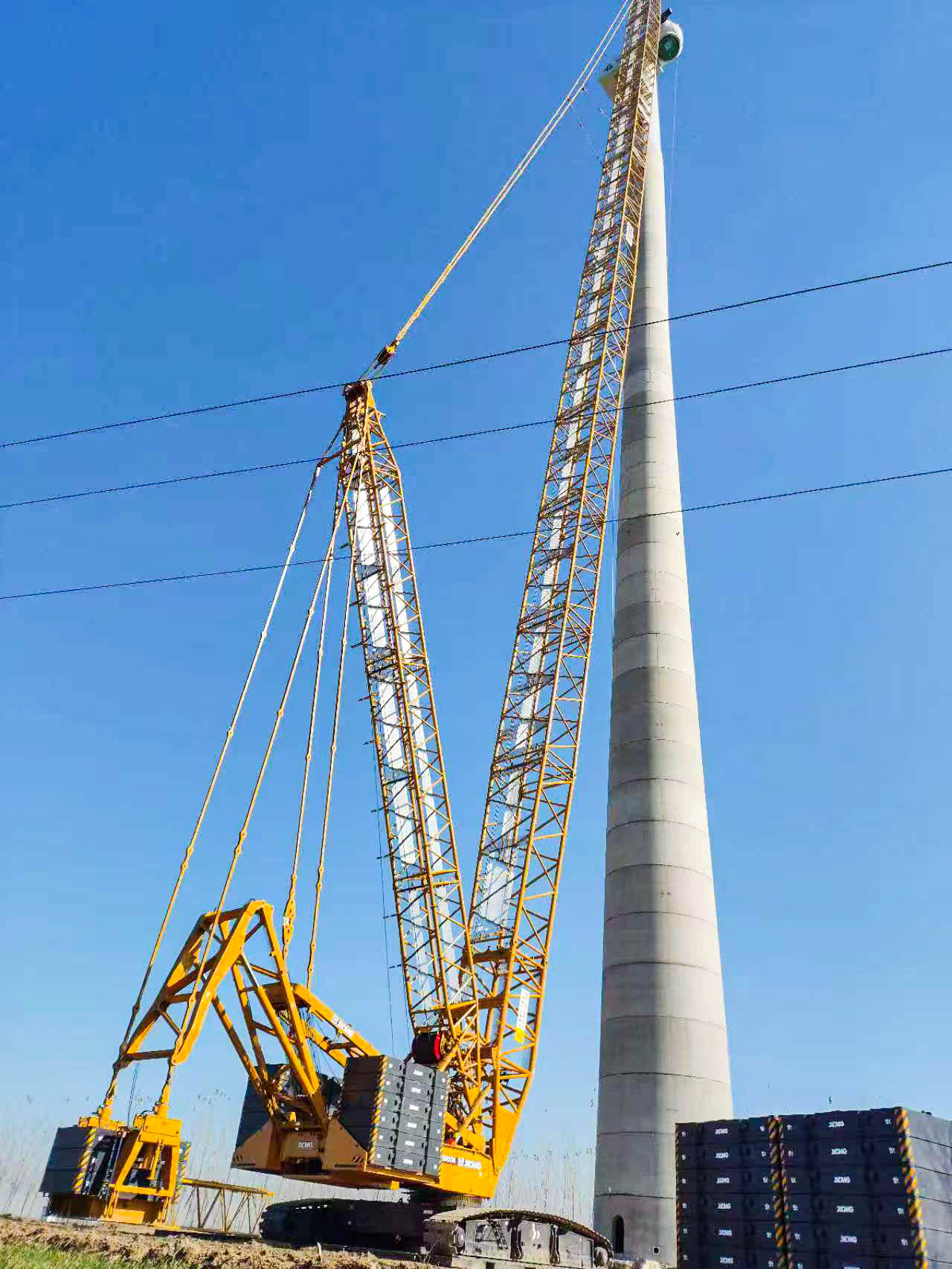 160米高空精准“搭积木”：304am永利集团XLC15000M分体吊装6.25兆瓦风机全纪录